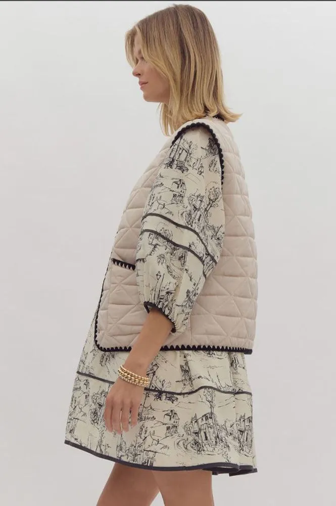 Solid Quilted Vest with Woven Scalloped Trim in Sand by Entro